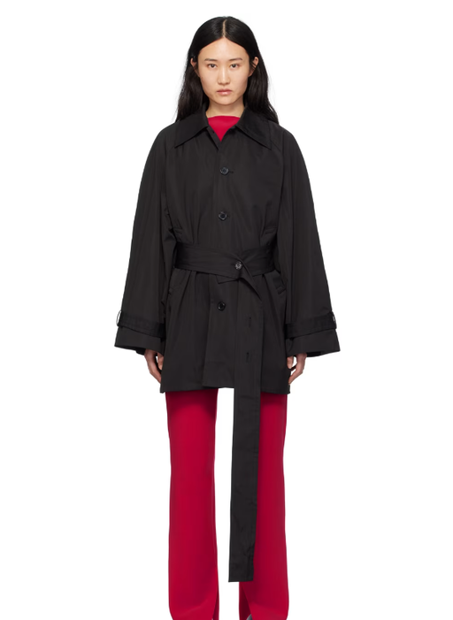 A woman wearing BIRROT black car coat