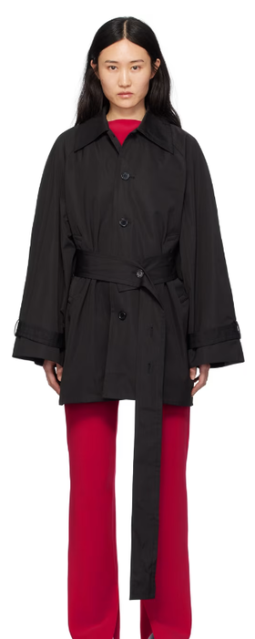 A woman wearing BIRROT black car coat