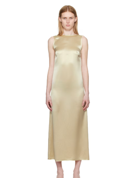 A woman wearing BY MALENE BIRGER off-white audette maxi dress