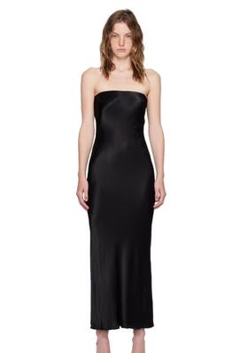 A woman wearing BEC + BRIDGE black moon dance maxi dress