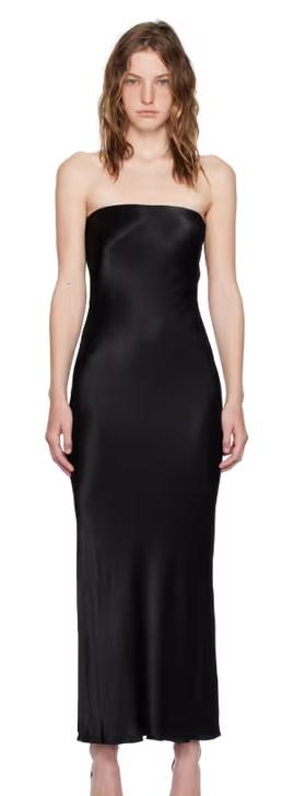 A woman wearing BEC + BRIDGE black moon dance maxi dress
