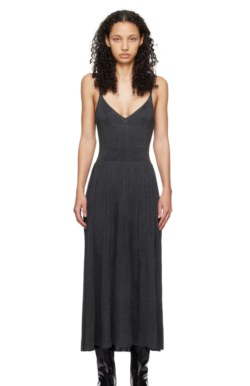 A woman wearing ARCH4 gray princess maxi dress