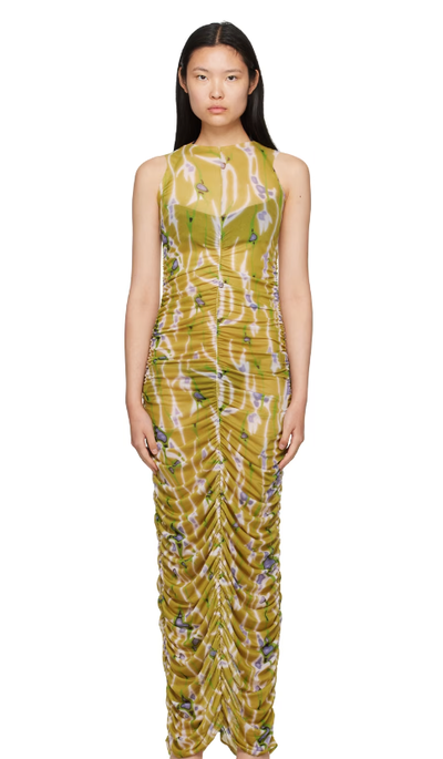 A woman wearing BINYA green lisa maxi dress