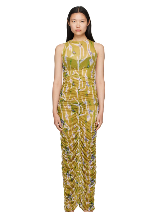 A woman wearing BINYA green lisa maxi dress