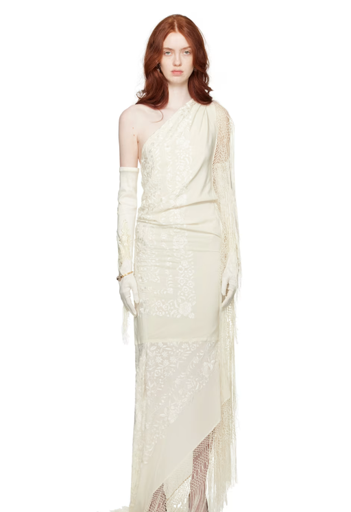 A woman wearing CONNER IVES off-white piano shawl maxi dress