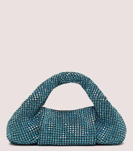 An image of Stuart Weitzman aquamarine moda shine mini tote