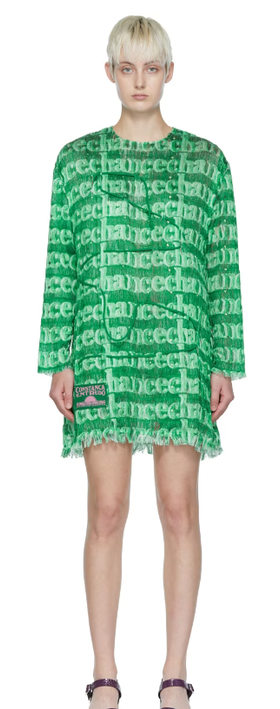 A woman wearing CONSTANÇA ENTRUDO green beaded cord dress