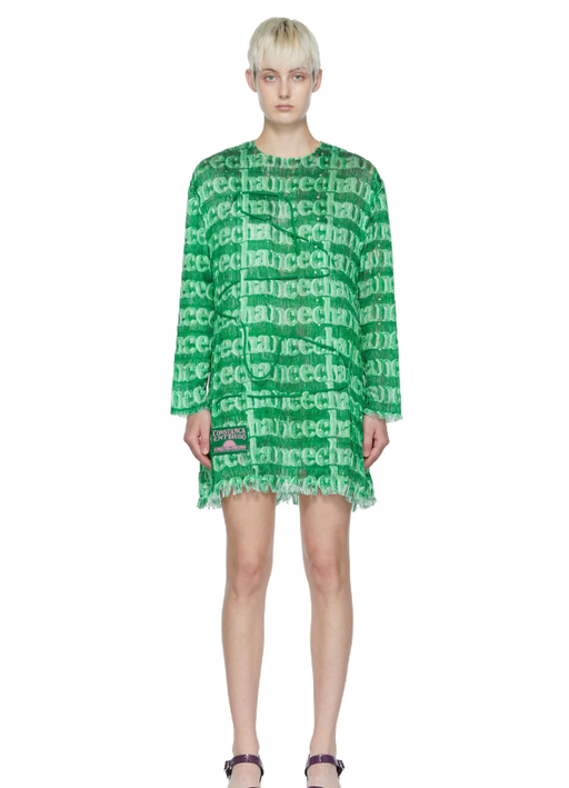 A woman wearing CONSTANÇA ENTRUDO green beaded cord dress