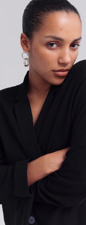 A woman wearing Trine Tuxen Jewelry equal earring