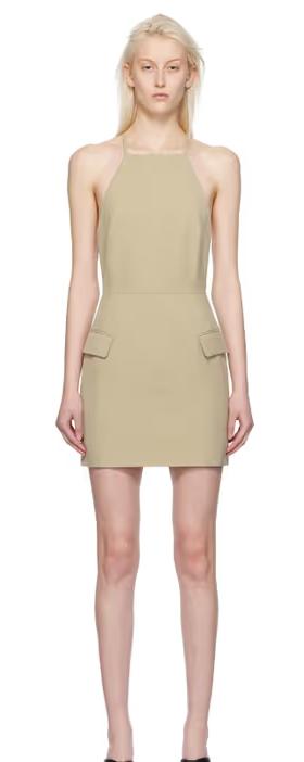 A woman wearing CAMILLA AND MARC beige arwin minidress