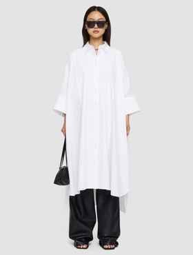 A woman wearing Joseph white poplin dania dress