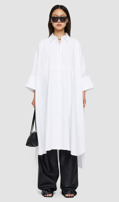 A woman wearing Joseph white poplin dania dress