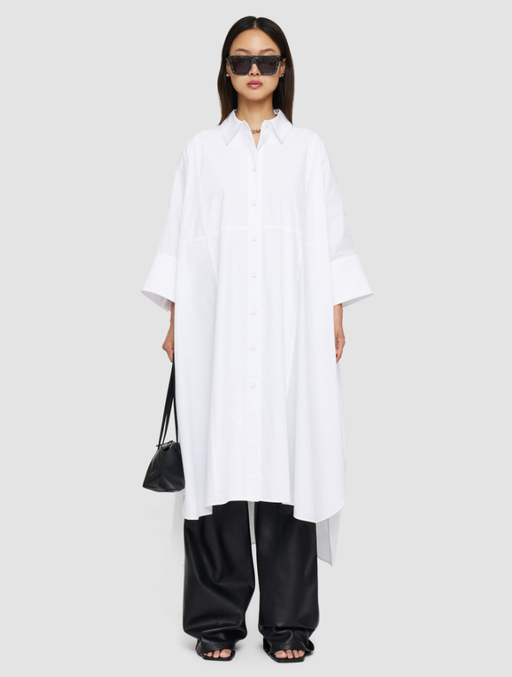 A woman wearing Joseph white poplin dania dress