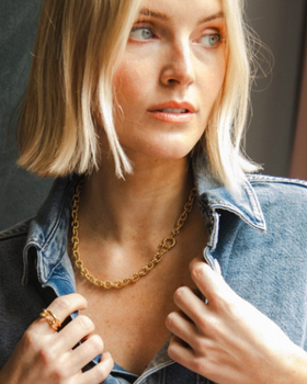 A woman wearing DAISY LONDON polly sayer vintage rope chain necklace