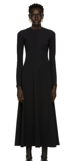 A woman wearing CAES black jersey dress
