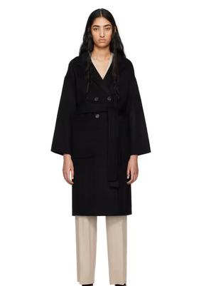 A woman wearing ANINE BING black dylan coat
