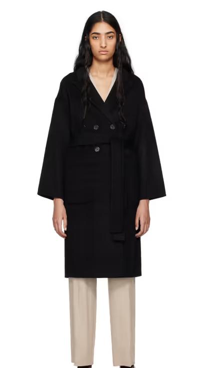 A woman wearing ANINE BING black dylan coat