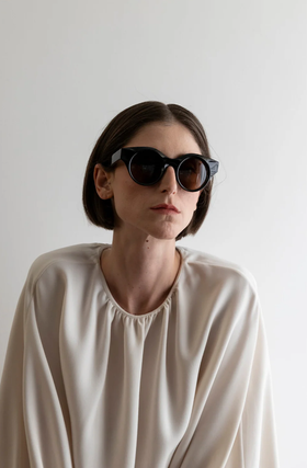 A woman wearing Lapima black matilde sunglass
