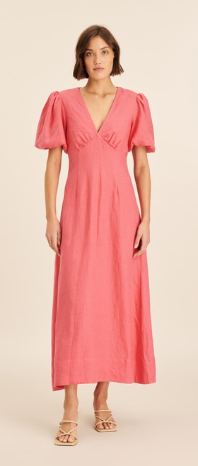A woman wearing AERE linen gathered v neck puff sleeve midi dress