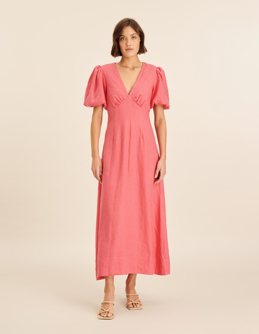 A woman wearing AERE linen gathered v neck puff sleeve midi dress