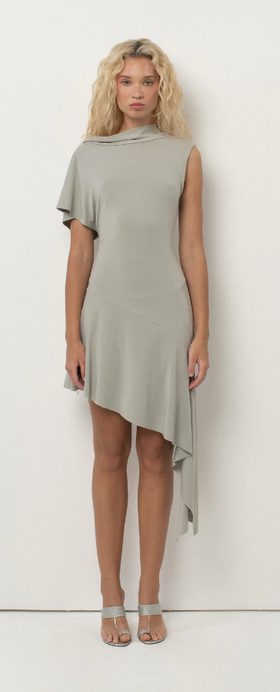 A woman wearing Bellethelabel plume dress – silver