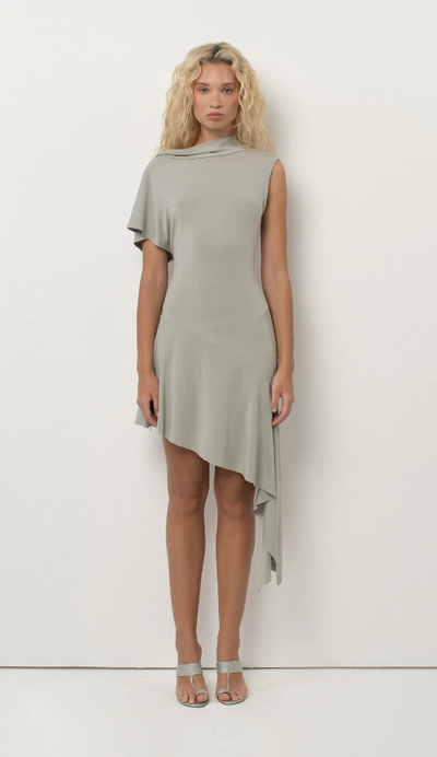 A woman wearing Bellethelabel plume dress – silver