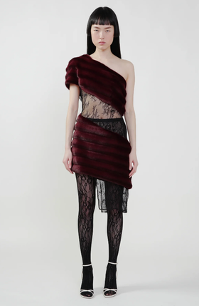 A woman wearing KIM SHUI bordeaux color aubergine faux fur combo dress
