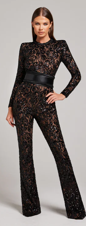 A woman wearing Nadine Merabi bella black jumpsuit
