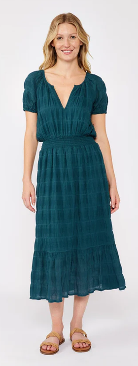 A woman wearing Lovestitch midnight teal midi dress
