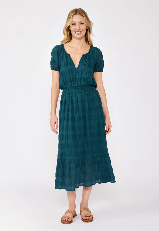 A woman wearing Lovestitch midnight teal midi dress
