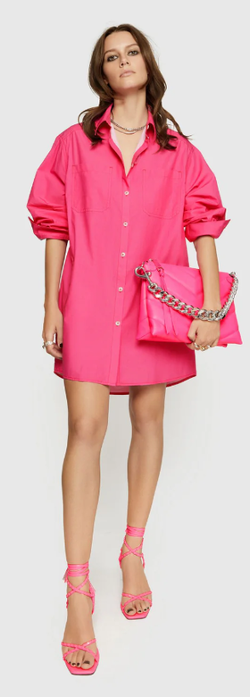 A woman wearing Rebecca Minkoff hot pink tori dress