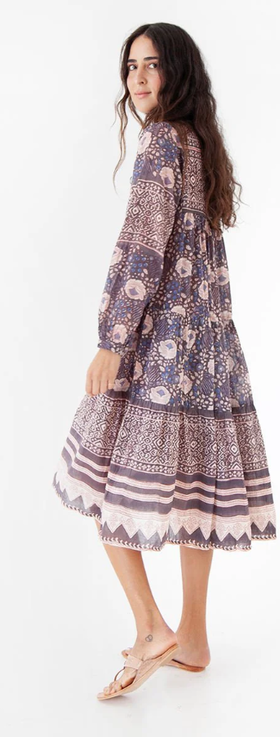 A woman wearing Matta NY yamini booj dress, shadow