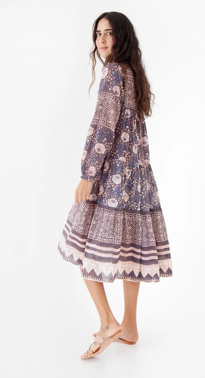 A woman wearing Matta NY yamini booj dress, shadow