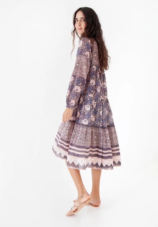 A woman wearing Matta NY yamini booj dress, shadow