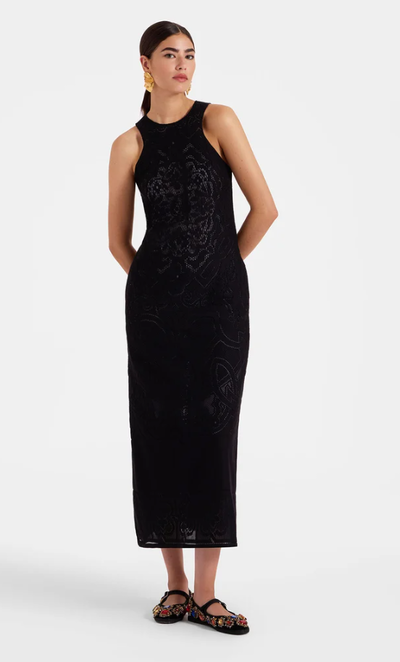 A woman wearing La DoubleJ black lacey racer dress