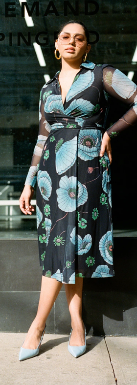 A woman wearing Wray NYC enid wrap dress