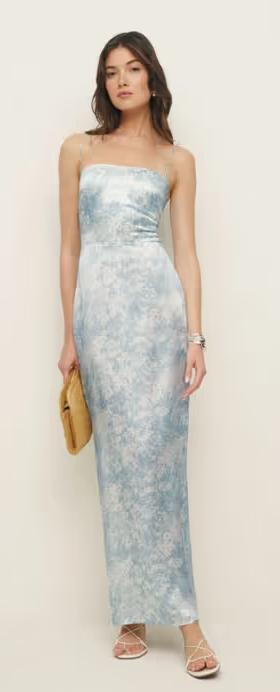 A woman wearing Reformation frankie silk dress