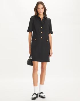 A woman wearing Tory Burch black camp dress