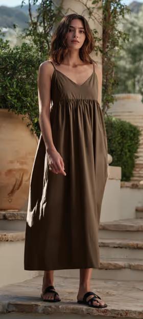 A woman wearing Jenni Kayne olive cove dress