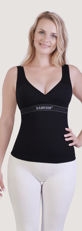 A woman wearing Sankom sankom patent activewear top - black & silver