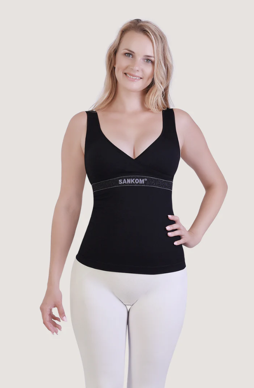 A woman wearing Sankom sankom patent activewear top - black & silver