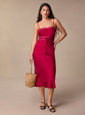 A woman wearing Rouje reda dress