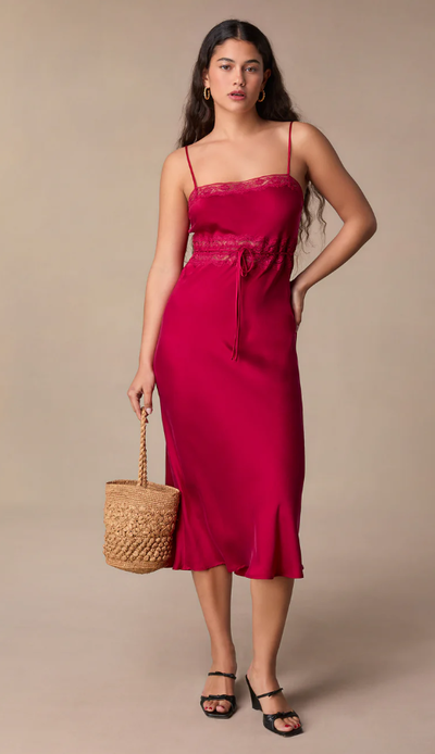 A woman wearing Rouje reda dress