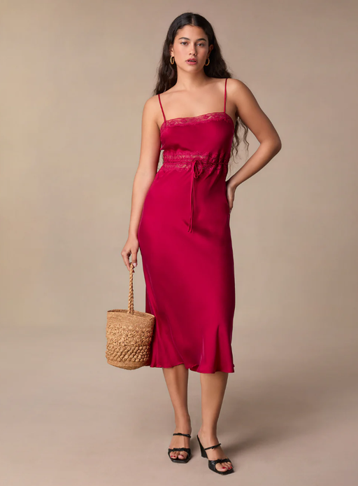 A woman wearing Rouje reda dress