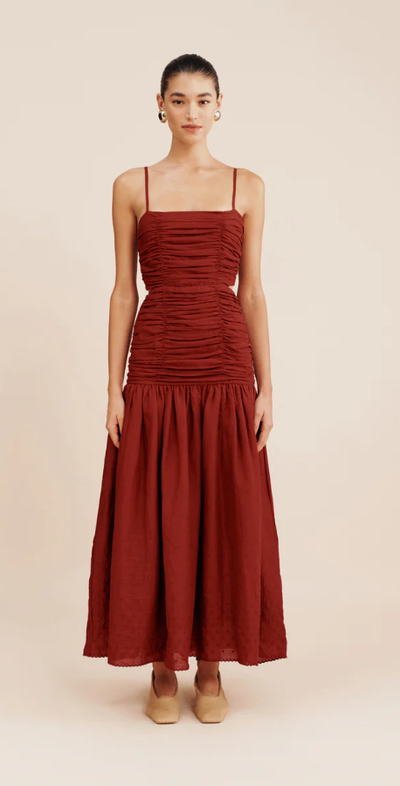 A woman wearing Posse aurelia dress - merlot