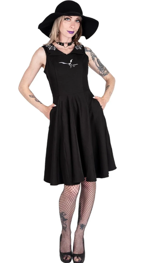 A woman wearing Too Fast orchid bloom | flying bats & web collar swing dress