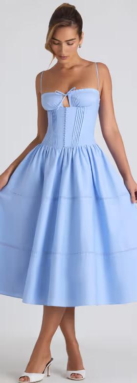 A woman wearing Oh Polly lace-trim pintucked poplin midaxi dress in sky blue