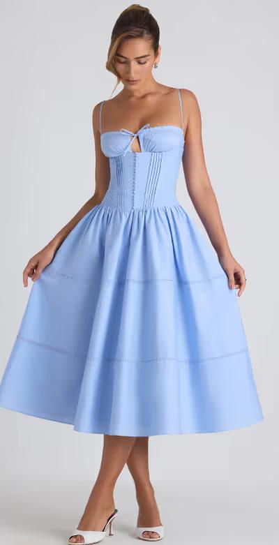 A woman wearing Oh Polly lace-trim pintucked poplin midaxi dress in sky blue