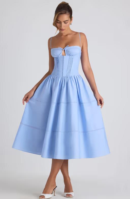 A woman wearing Oh Polly lace-trim pintucked poplin midaxi dress in sky blue