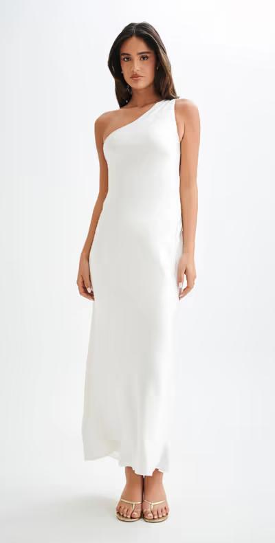 A woman wearing Meshki one shoulder satin maxi dress - white